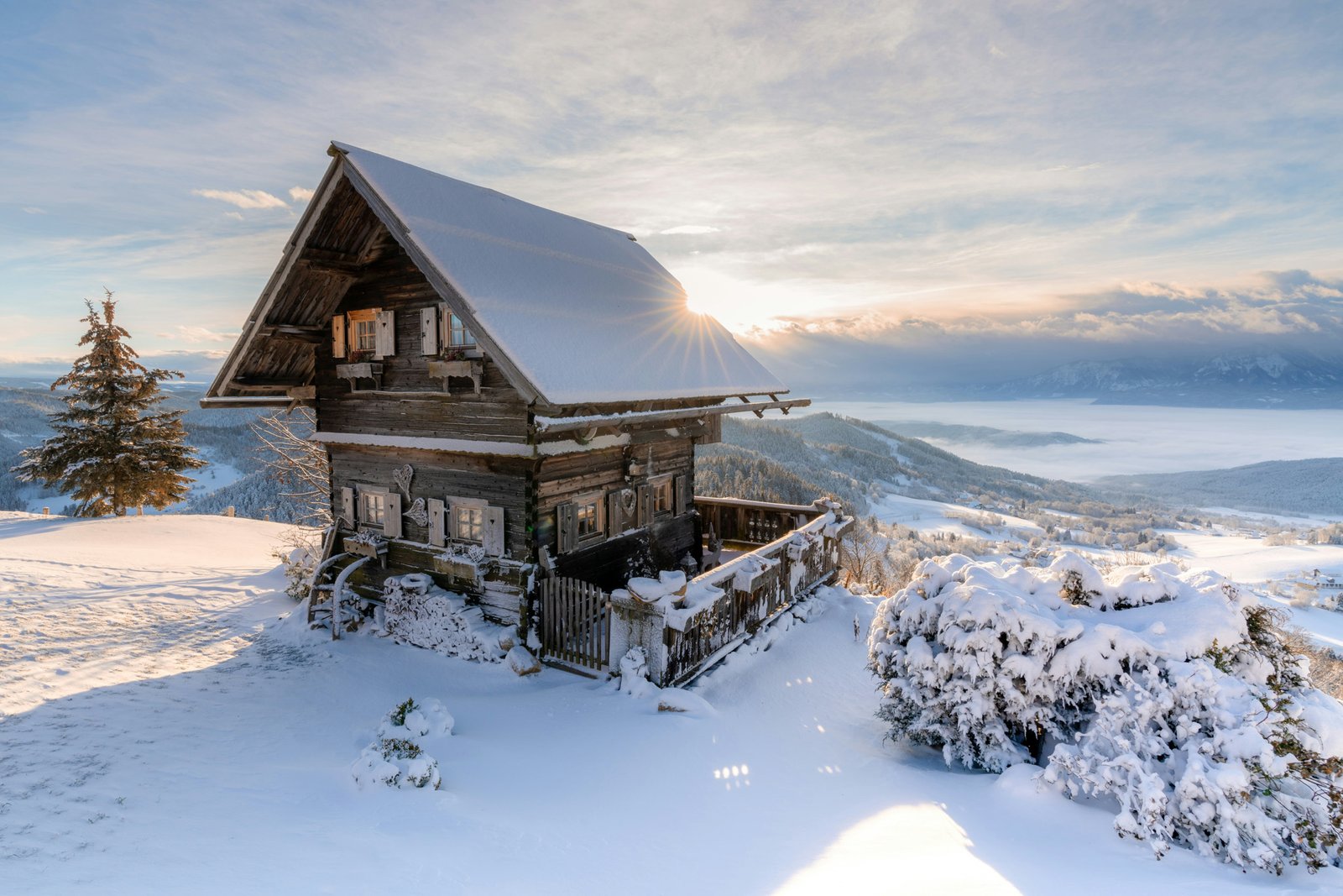 A traditional wooden granary (Troadkasten), sitting perfectly in the snow at the summit of Magdalensberg - Carinthia, Austri