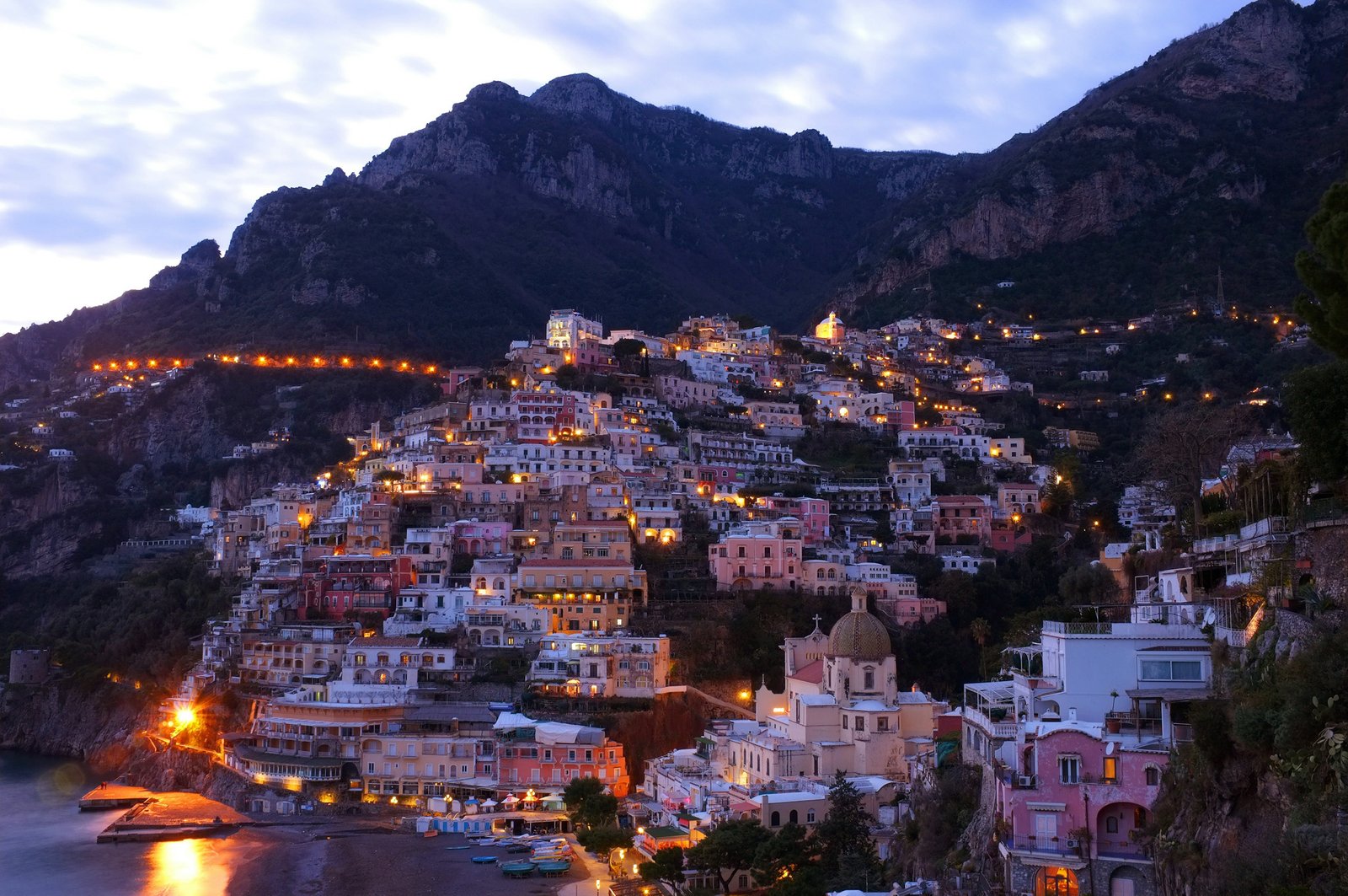 twilight views of Positano, the iconic, cliffside village on Italy's Amalfi Coast